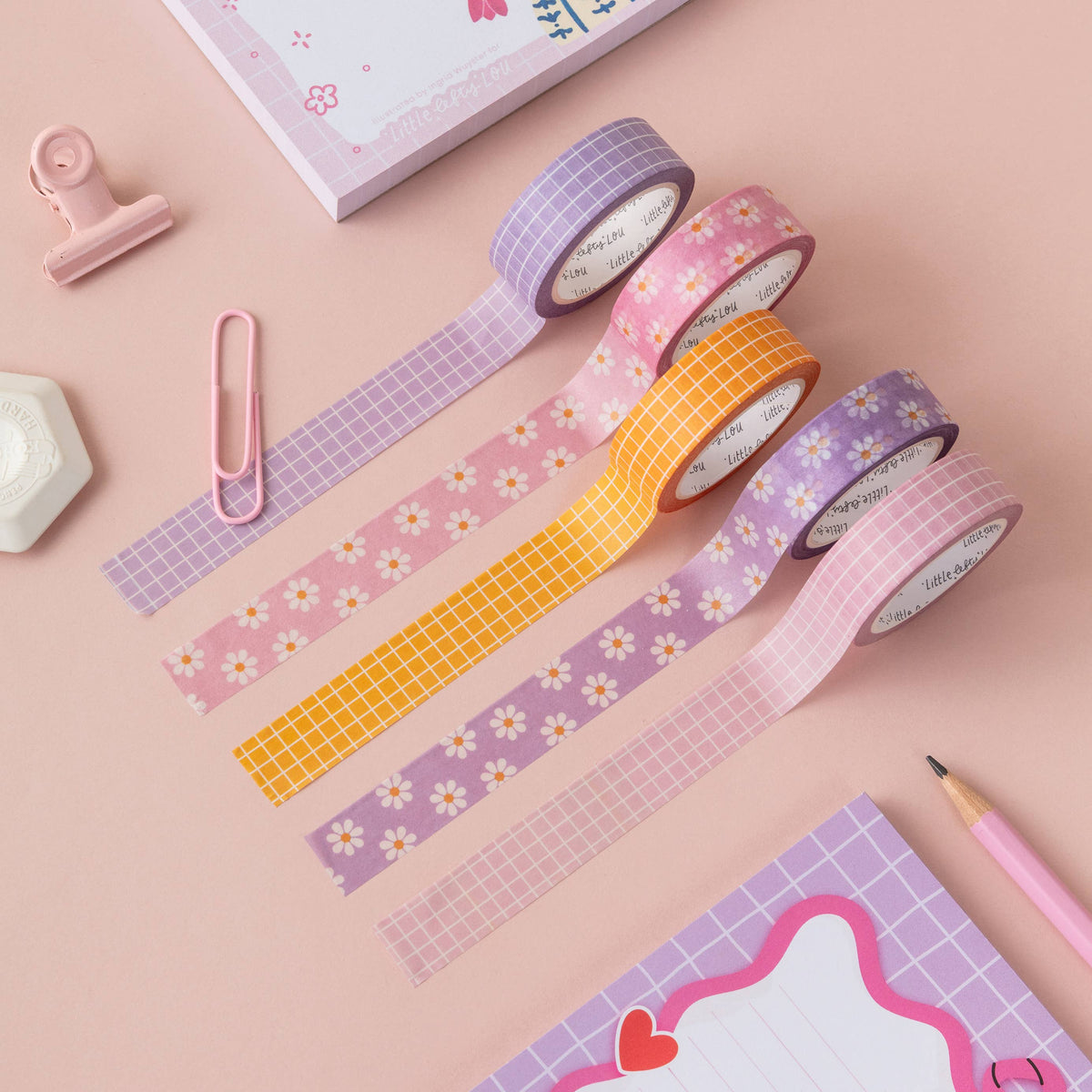 Washi tape set with lilac grid, orange check, and floral daisy patterns
