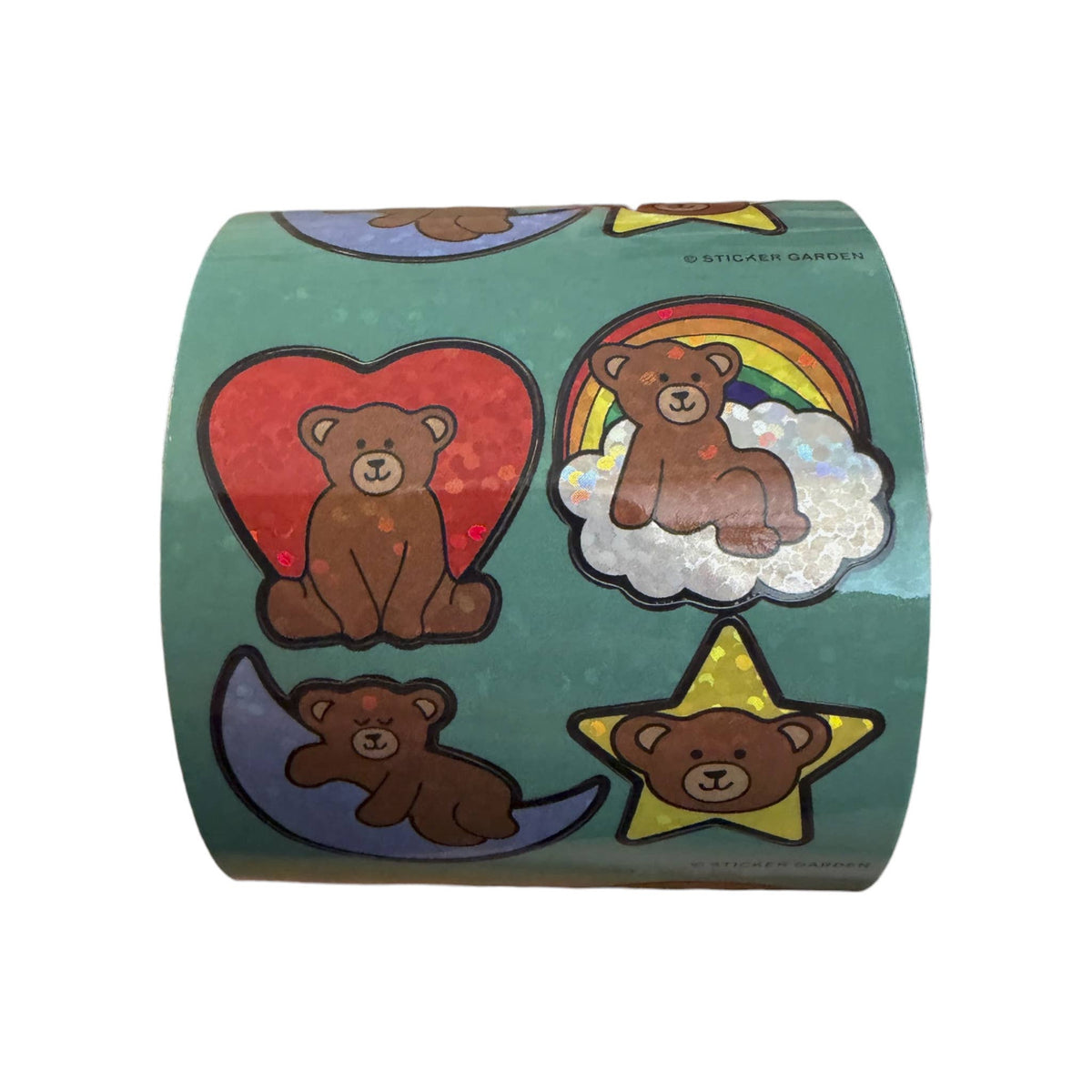 Green sticker roll with cute bear faces, clouds, and a star design