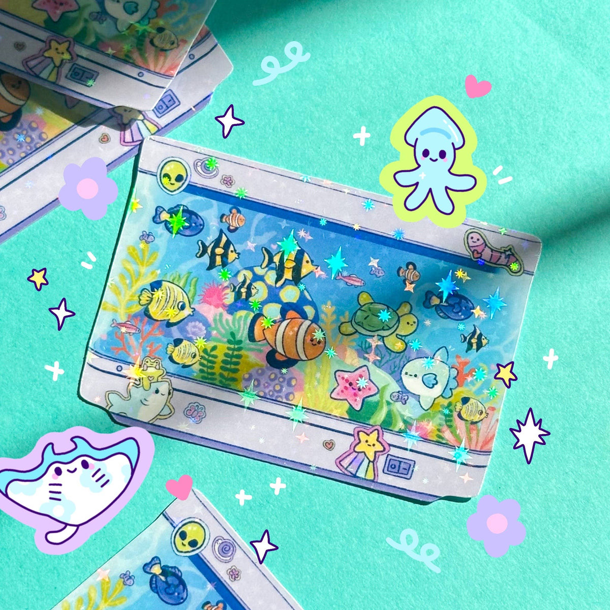 Holographic fish tank sticker with colorful fish, sea plants, bubbles, stars, and hearts