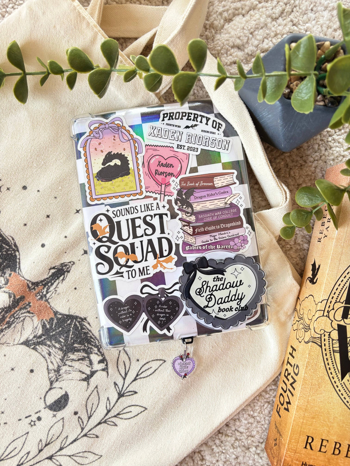 Assorted dark and purple text vinyl stickers on a backing card