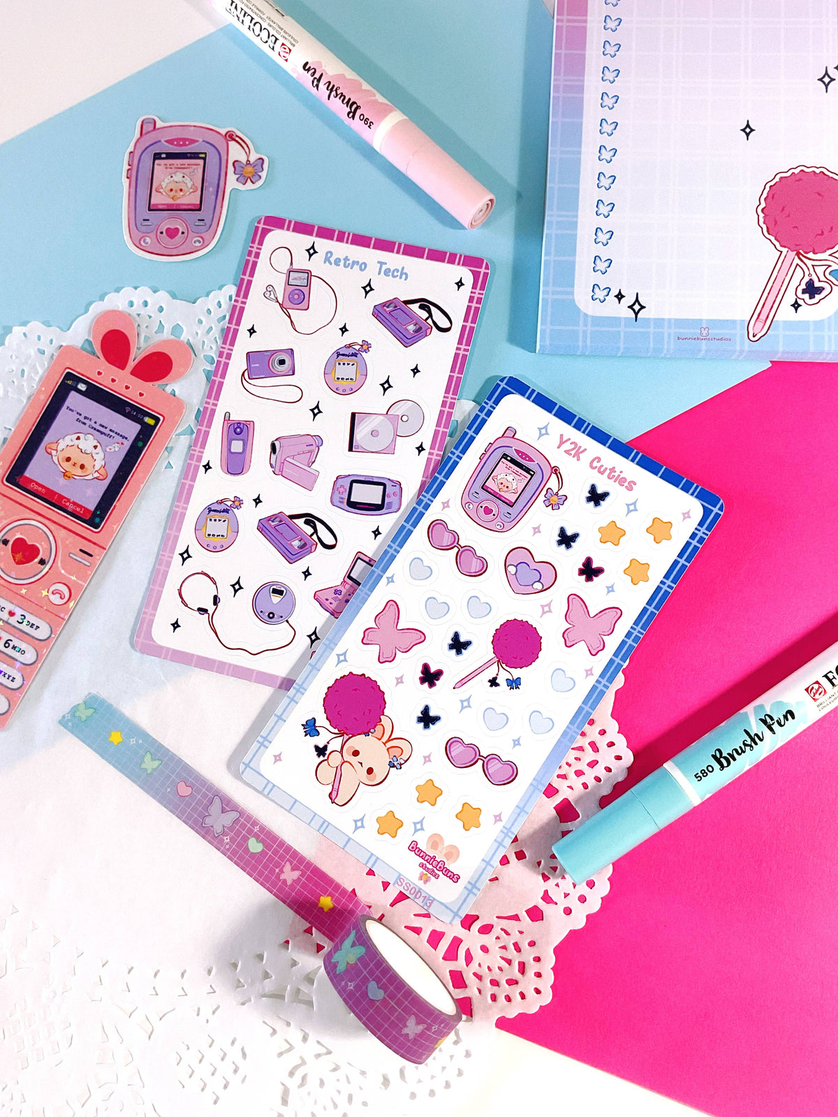 Sticker sheet with Y2K cuties mouse, phones, hearts, stars, and pink bows