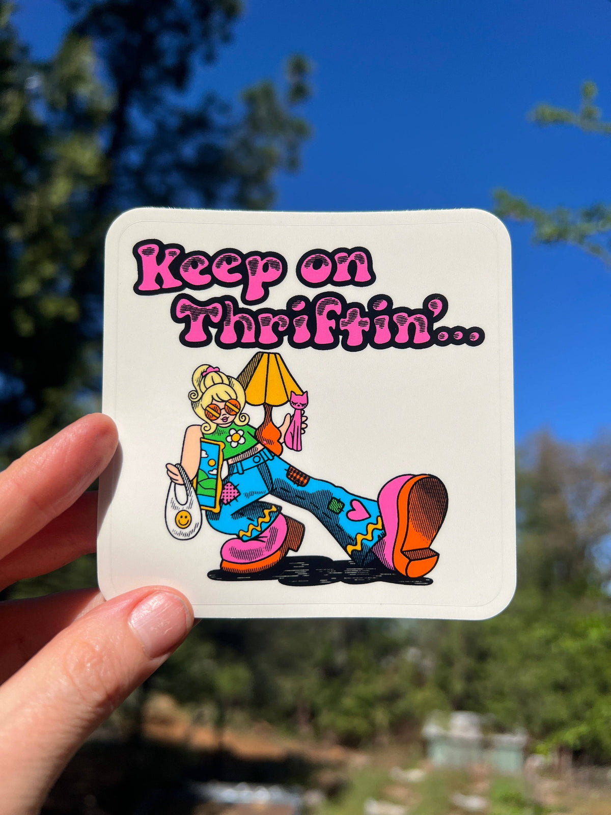 3-inch rectangular Keep on Thriftnin sticker with colorful cartoon figure and bold text