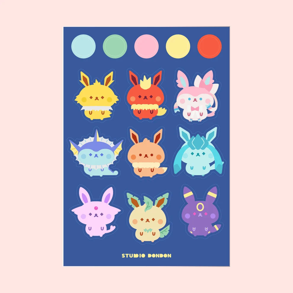 Vinyl sticker sheet with multiple Eevee evolution character stickers and color circles