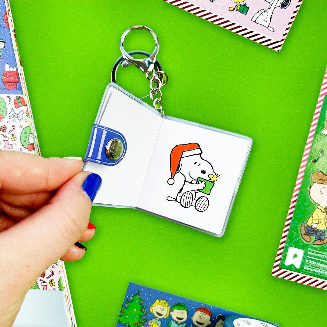 Rectangular mini sticker book keychain open, Snoopy with orange hat page and key rings