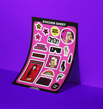 A5 sticker sheet angled view, colorful characters and icons on pink with black frame