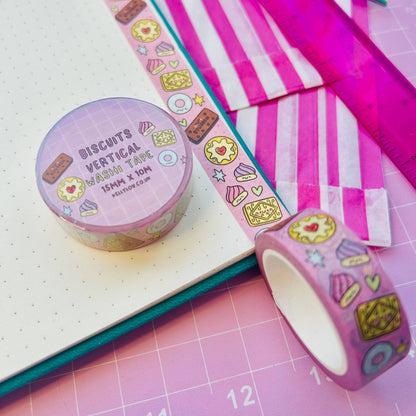 Pastel washi tape roll and ribbon strip with biscuit, heart, and star icons
