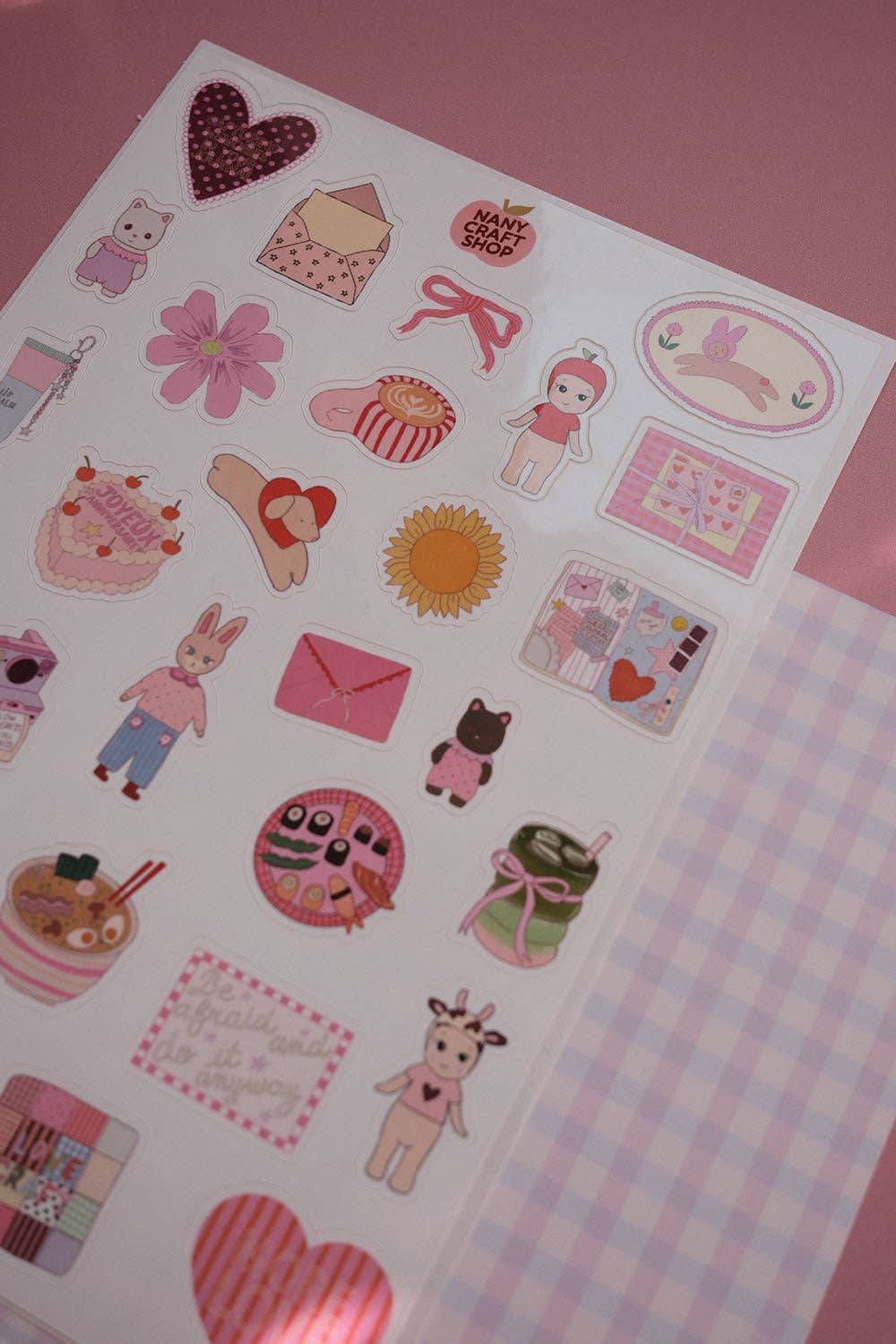 A5 mini sticker sheet with cute characters, hearts, envelopes, and patterned boxes on white