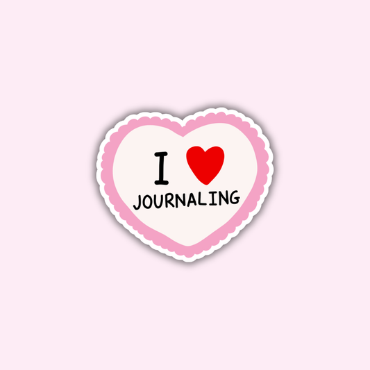 Pink heart sticker with 'I ♥ JOURNALING' text and red heart icon