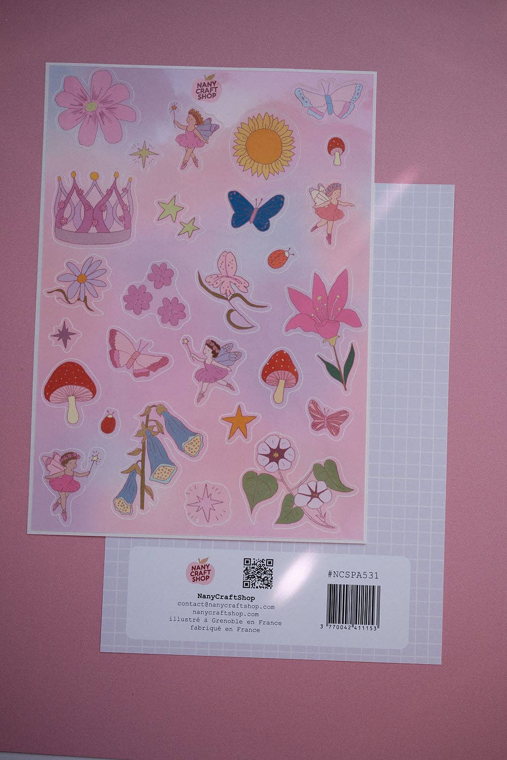 Fairy sticker sheet with colorful fairy, butterfly, flower, and star designs plus label