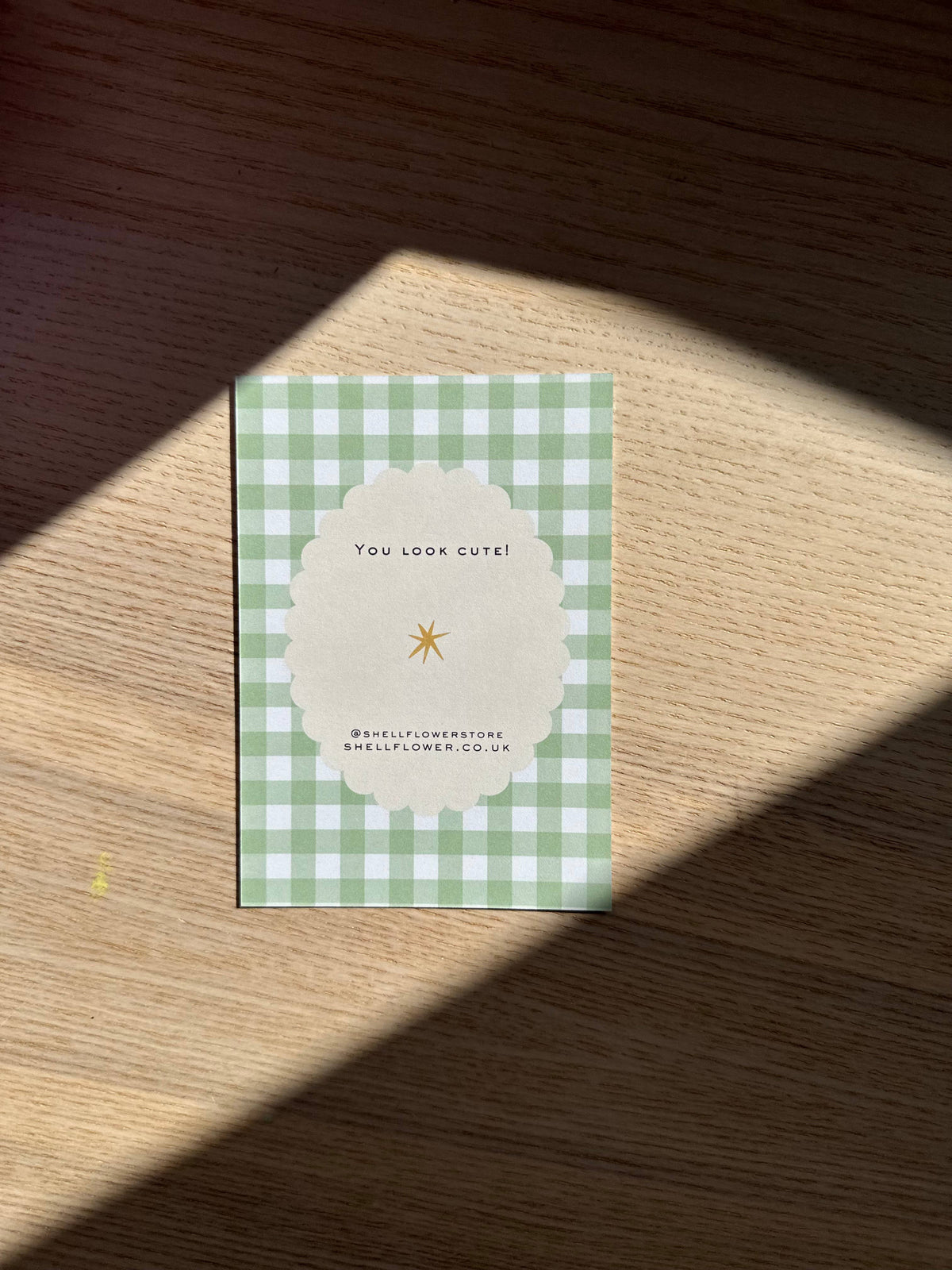 Gingham vinyl glitter sticker with small yellow sparkle emblem