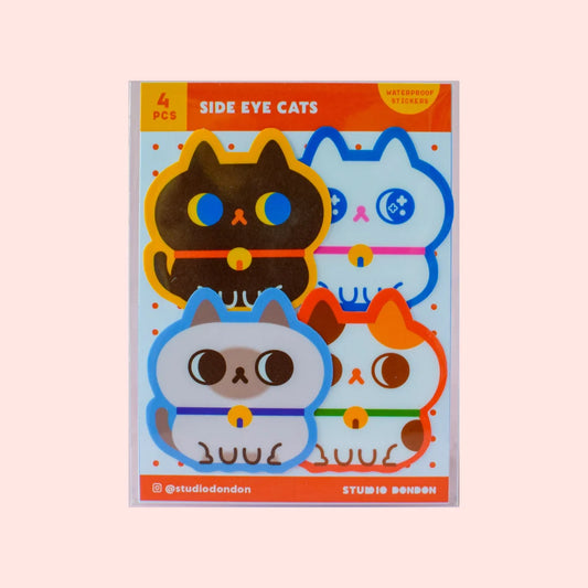 Vinyl sticker pack with four side-eye cat faces in bright colors
