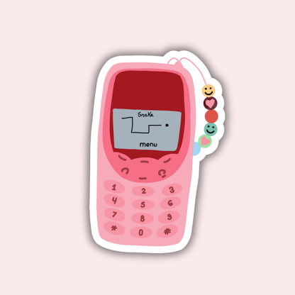 Pink cartoon phone sticker with keypad and small screen details