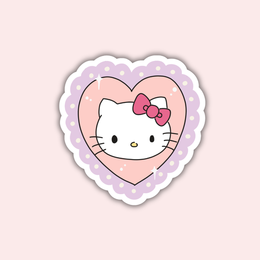 Heart-shaped Kitty sticker with pink cat face and purple bow, scalloped purple border