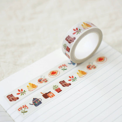 Decorative washi tape roll with illustrated breakfast motifs and long printed strip
