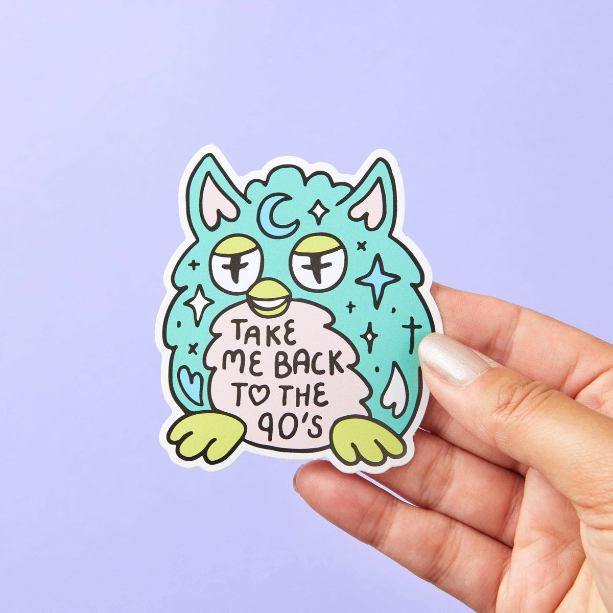 Teal cartoon vinyl sticker creature with big eyes; reads “Take me back to the 90’s” held by hand
