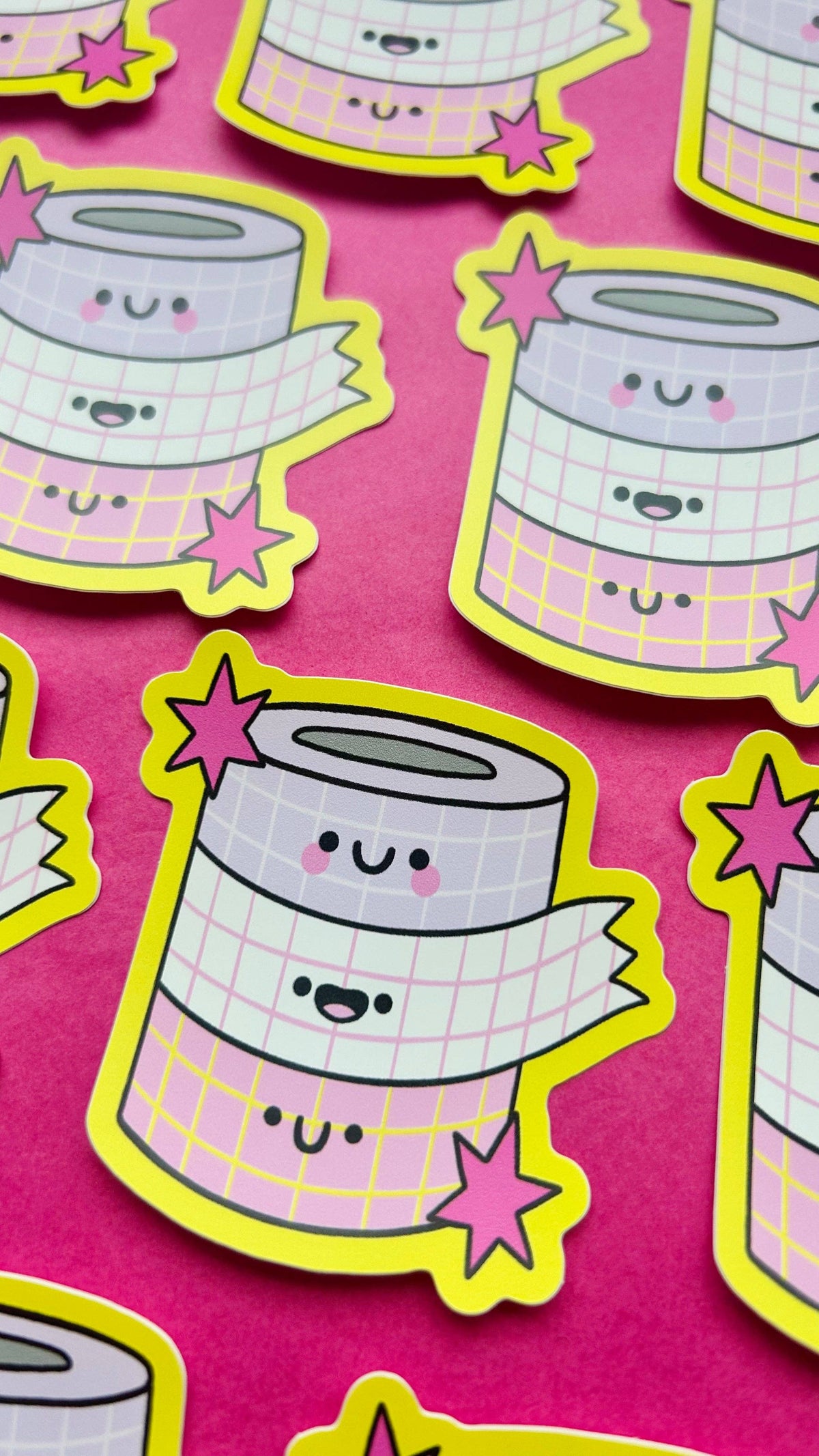 Cartoon vinyl stickers: stacked smiling grid cups with yellow stars