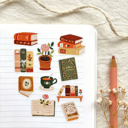 Bookish sticker sheet with book stacks, teacup, potted flowers, and bookmarks
