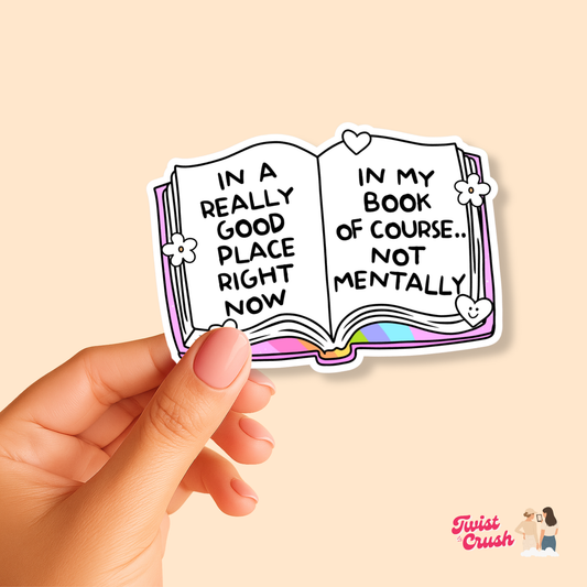Sticker showing an open book design with a quote, held in a hand