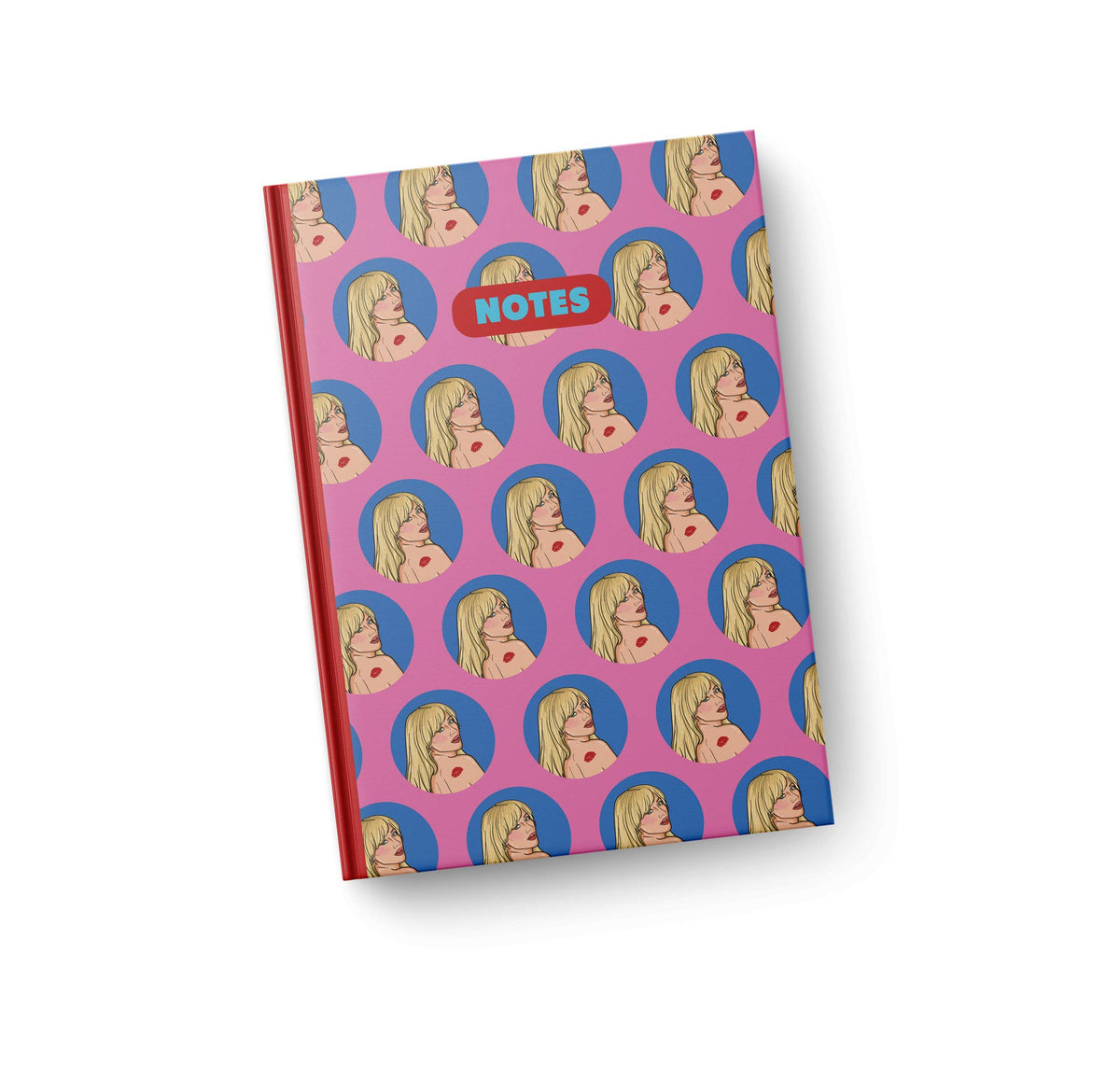 A5 notebook front cover with purple polka-face pattern, red spine edge, “NOTES” label.
