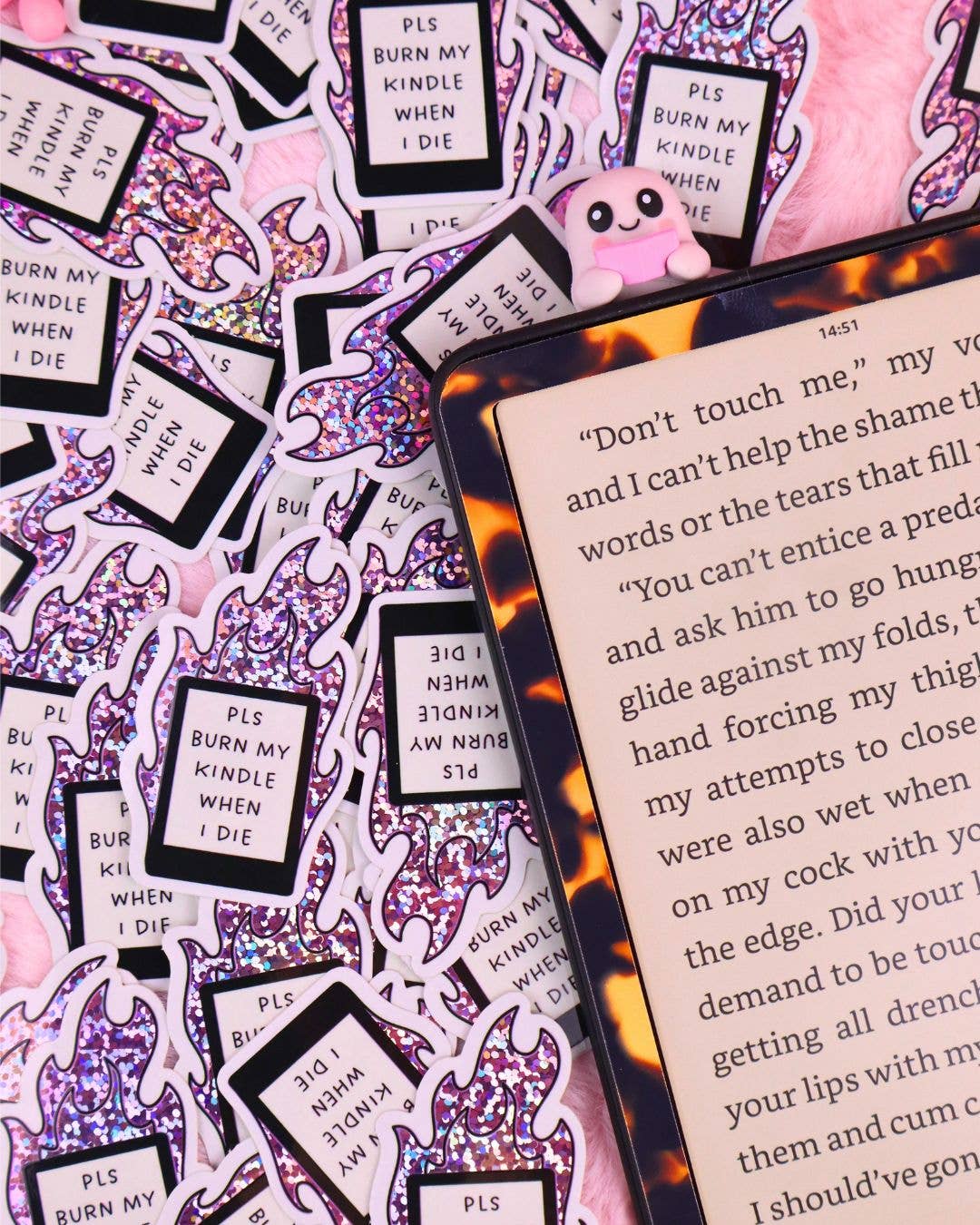 Vinyl waterproof sticker sheet with repeated purple flame quote labels and pink face sticker.