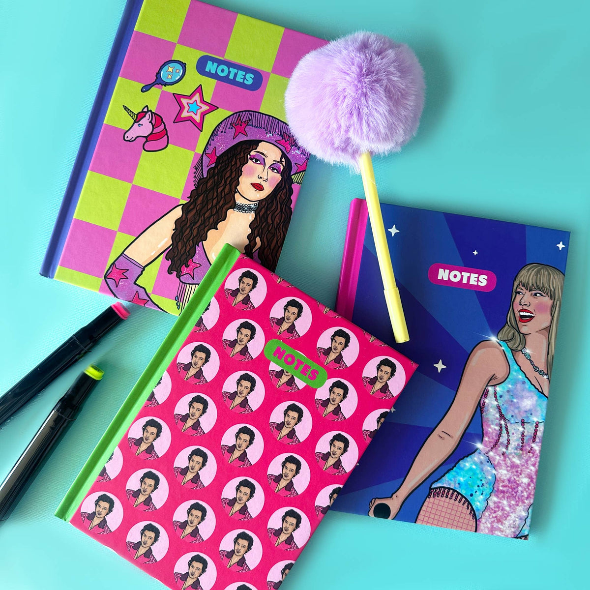 Set of A5 notebooks with purple and checkered covers, plus pom-pom pencil and loose stickers
