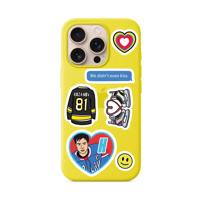Yellow phone case with hockey and heart stickers, jerseys, player logo, and kiss quote