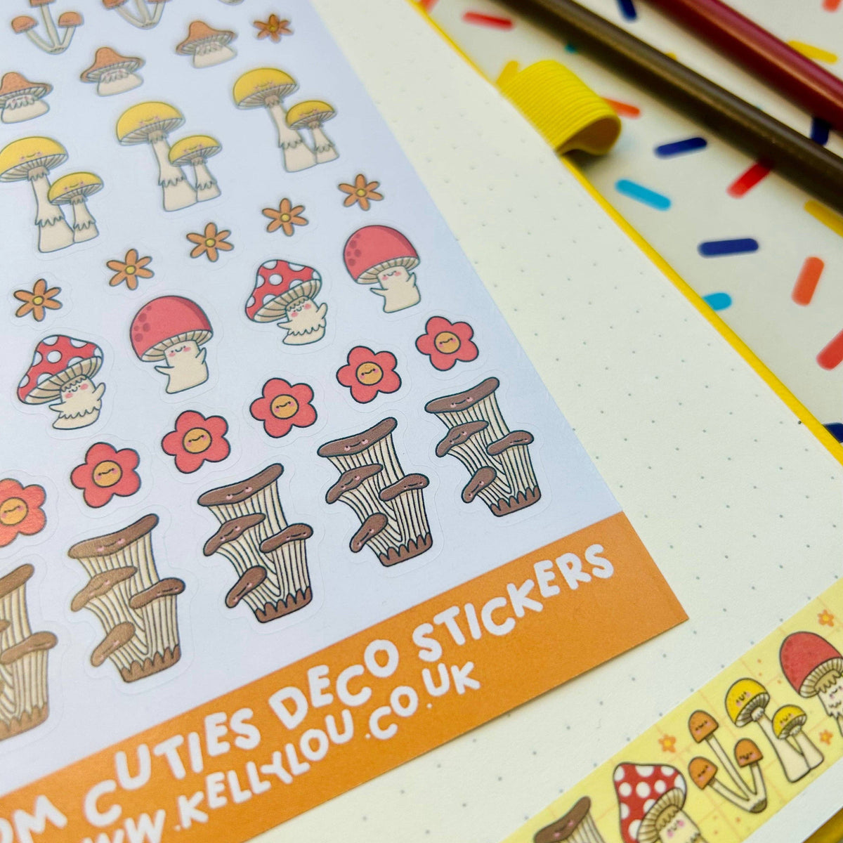 Close-up of deco stickers with red and cream mushroom characters, flowers, and striped caps