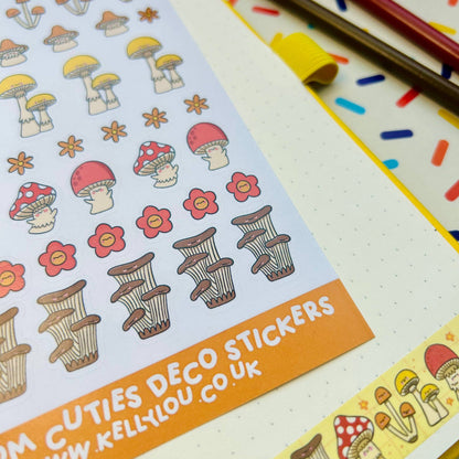 Close-up of deco stickers with red and cream mushroom characters, flowers, and striped caps