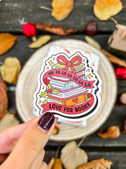 Christmas book-themed vinyl sticker with pink ribbon "Love for Books" design