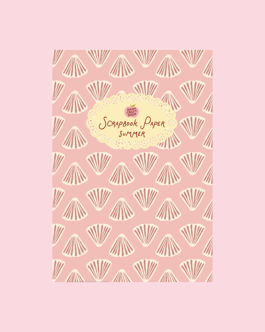 Scrapbook paper sheet with repeating seashell fan pattern in pink and beige