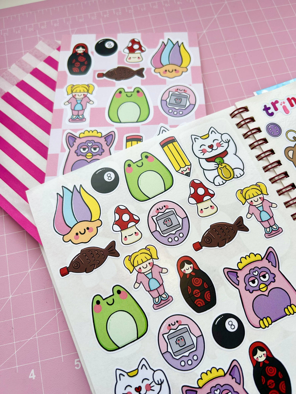 Sticker sheet with cat, avocado alien, strawberry, mushroom, rainbow, and girl stickers