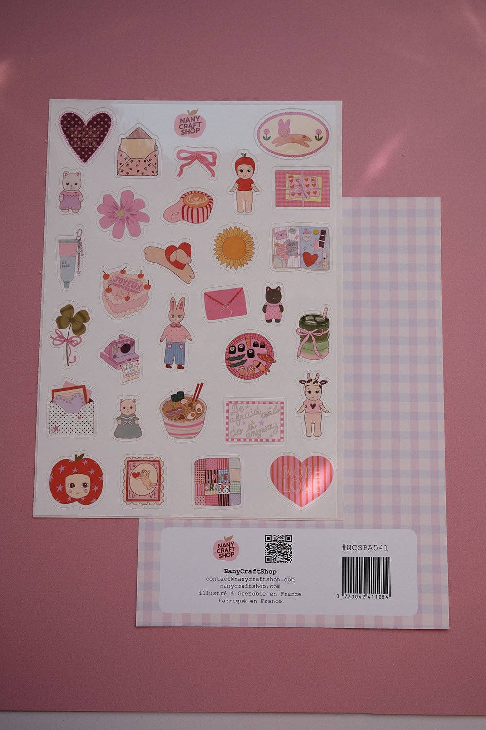 A5 mini sticker sheet with cute icons—hearts, rabbits, envelopes, flowers, food on white