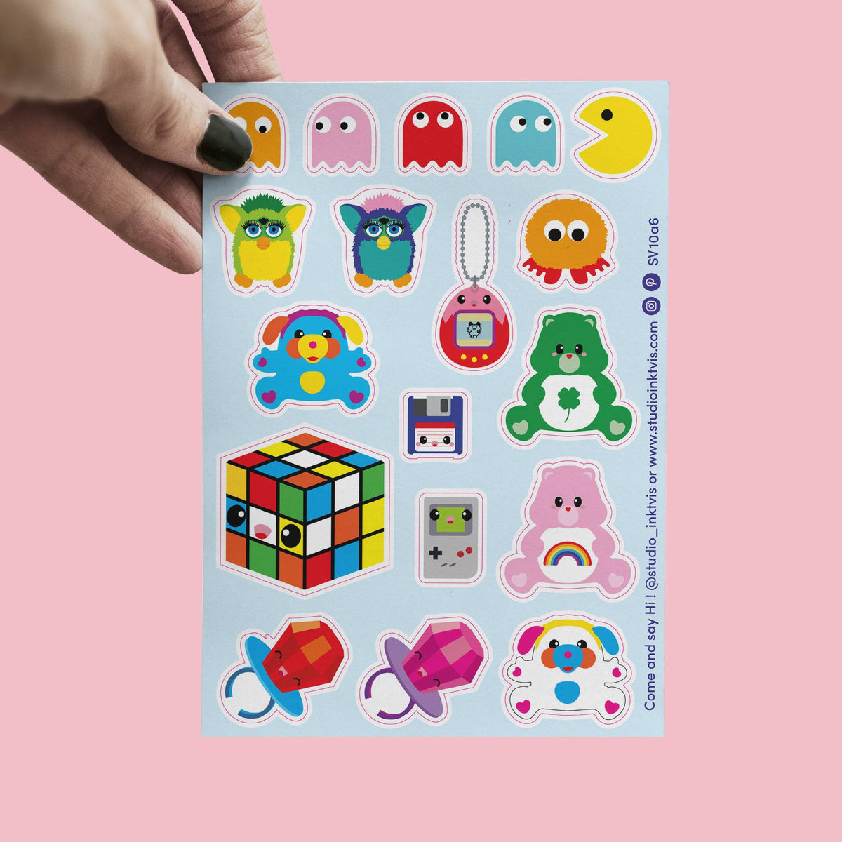 Sticker sheet with colorful 80s/90s characters, game cube, ghosts, pacifiers, monsters