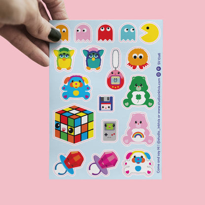 Sticker sheet with colorful 80s/90s characters, game cube, ghosts, pacifiers, monsters