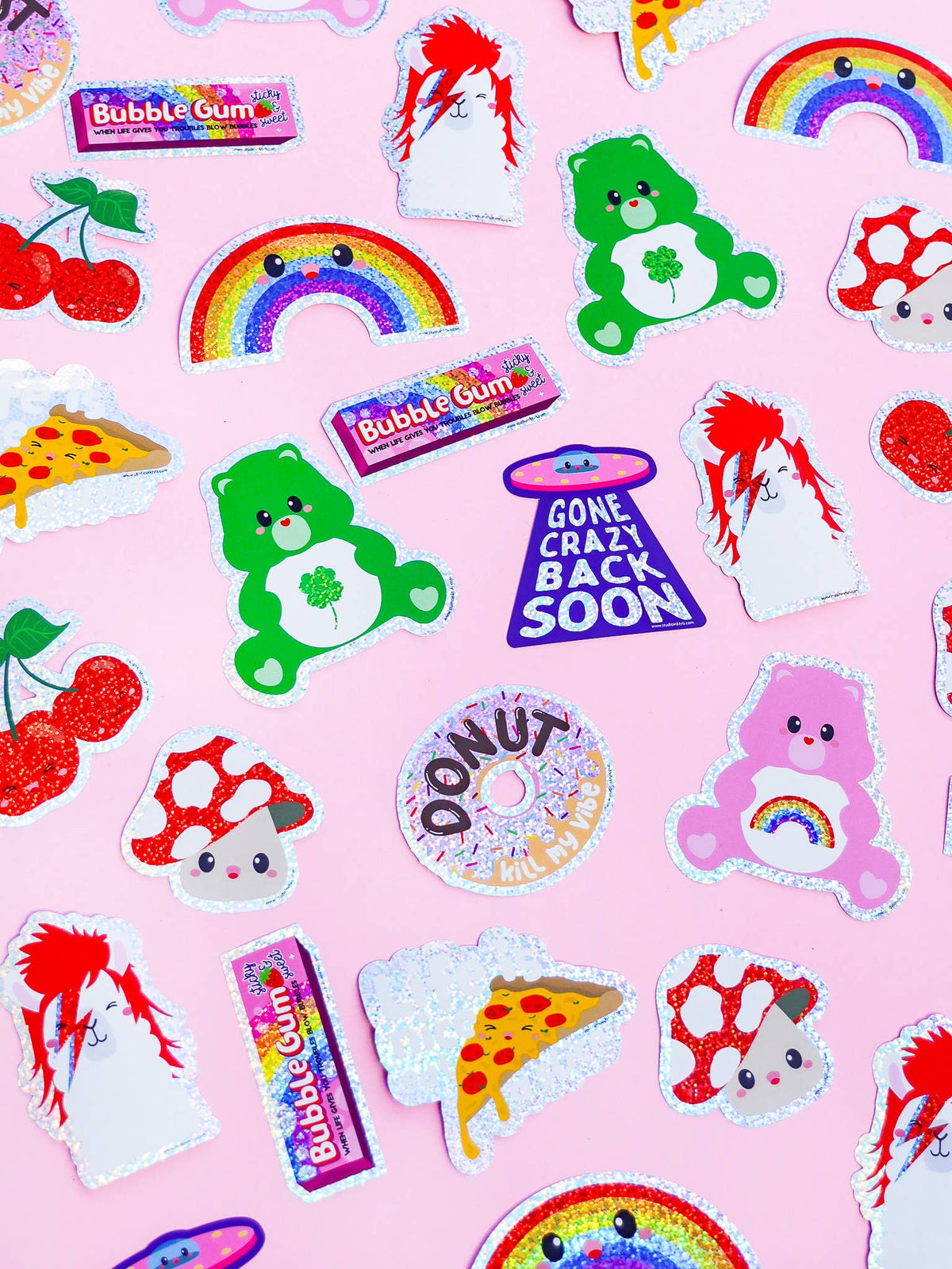 Glitter vinyl sticker sheet with characters, rainbows, pizza, and candy designs