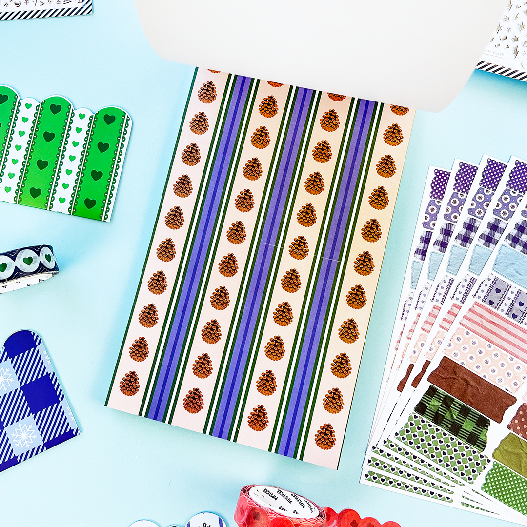 Striped winter sticker sheet with repeating pinecone icons in orange and brown