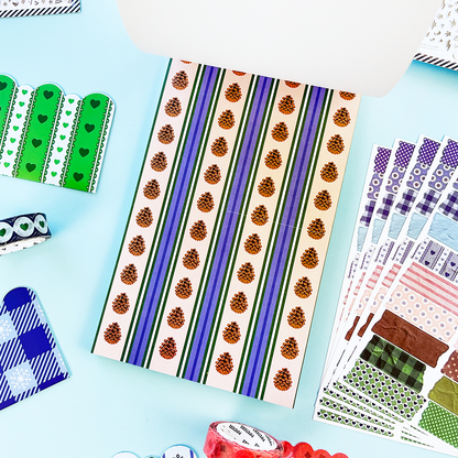 Striped winter sticker sheet with repeating pinecone icons in orange and brown
