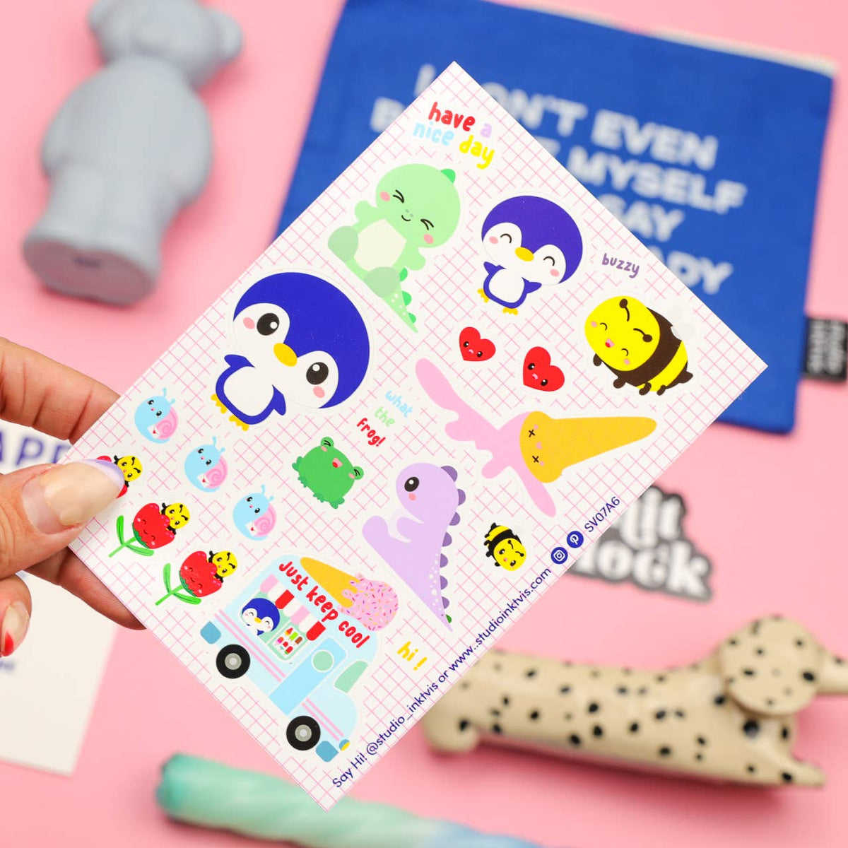 Sticker sheet with penguin, frog, bees, green dinosaur, and ice cream truck stickers