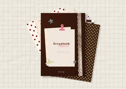 Scrapbook paper book with dark brown cover, lace border, star clip and pink paperclip