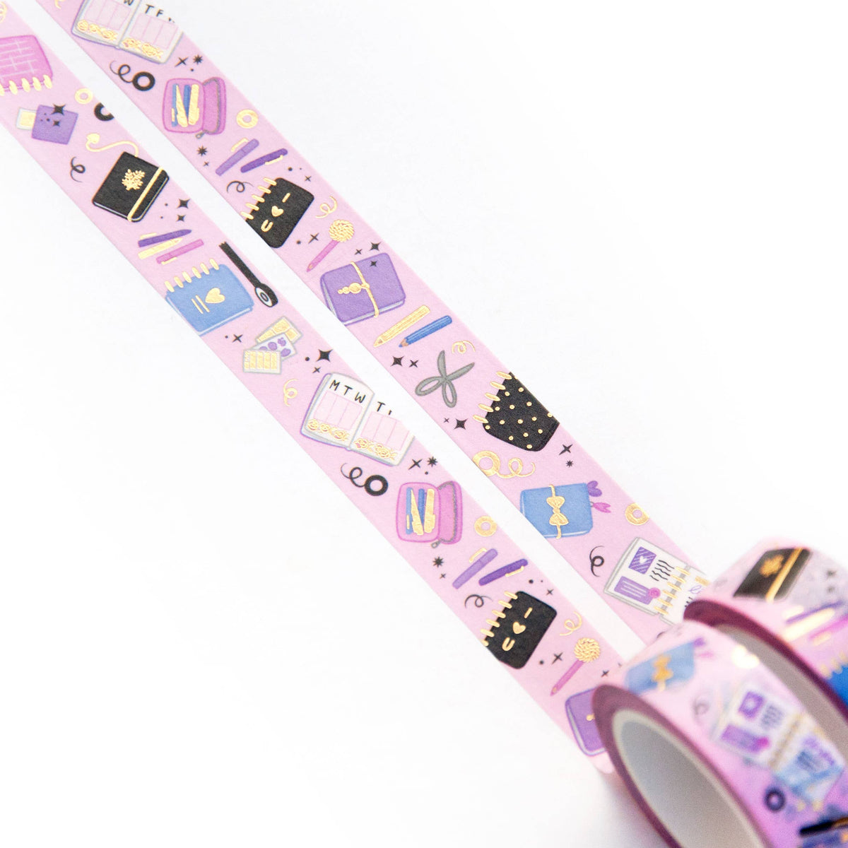 Washi tape roll showing stationery icons and a purple base on the ribbon
