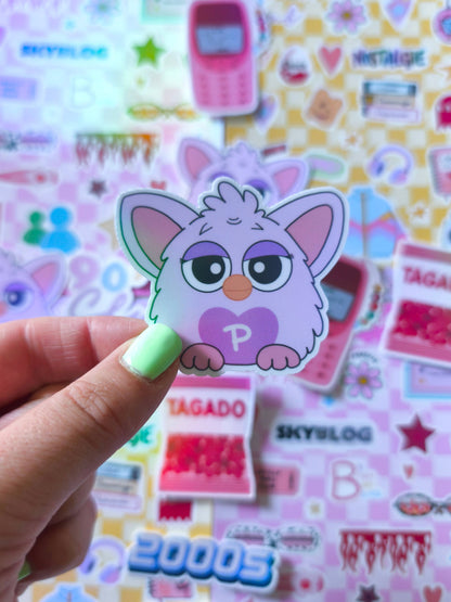 Popby cat face sticker held in hand, purple heart with letter P, white border