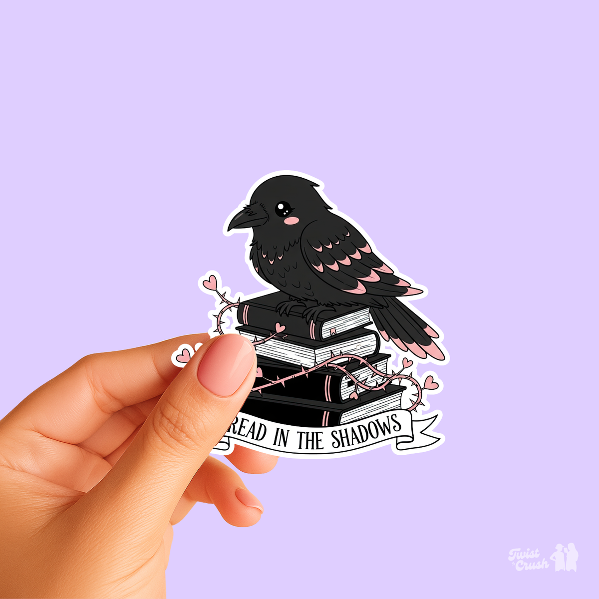 Raven reading sticker with stacked books and dark word art, die-cut outline