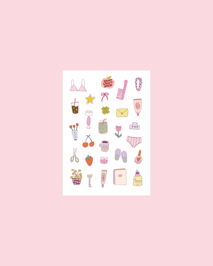 Sticker sheet with girly icons: dresses, shoes, envelopes, cherries, tulips, hearts