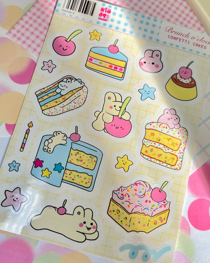 Cake and bunny sticker sheet with cupcakes, stars, and colorful candle icons