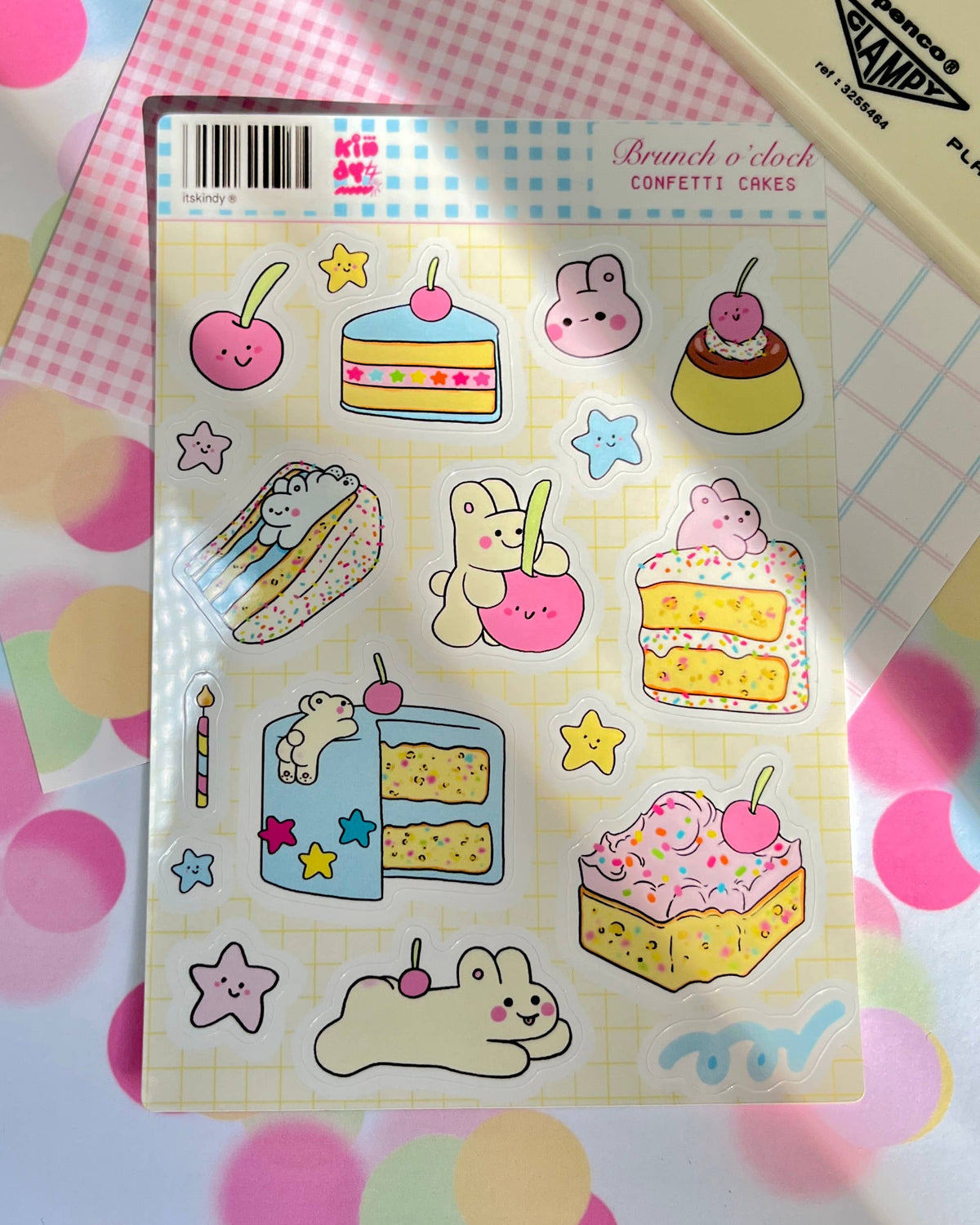 Colorful sticker sheet with cute bunnies, cakes, candles, and star shapes