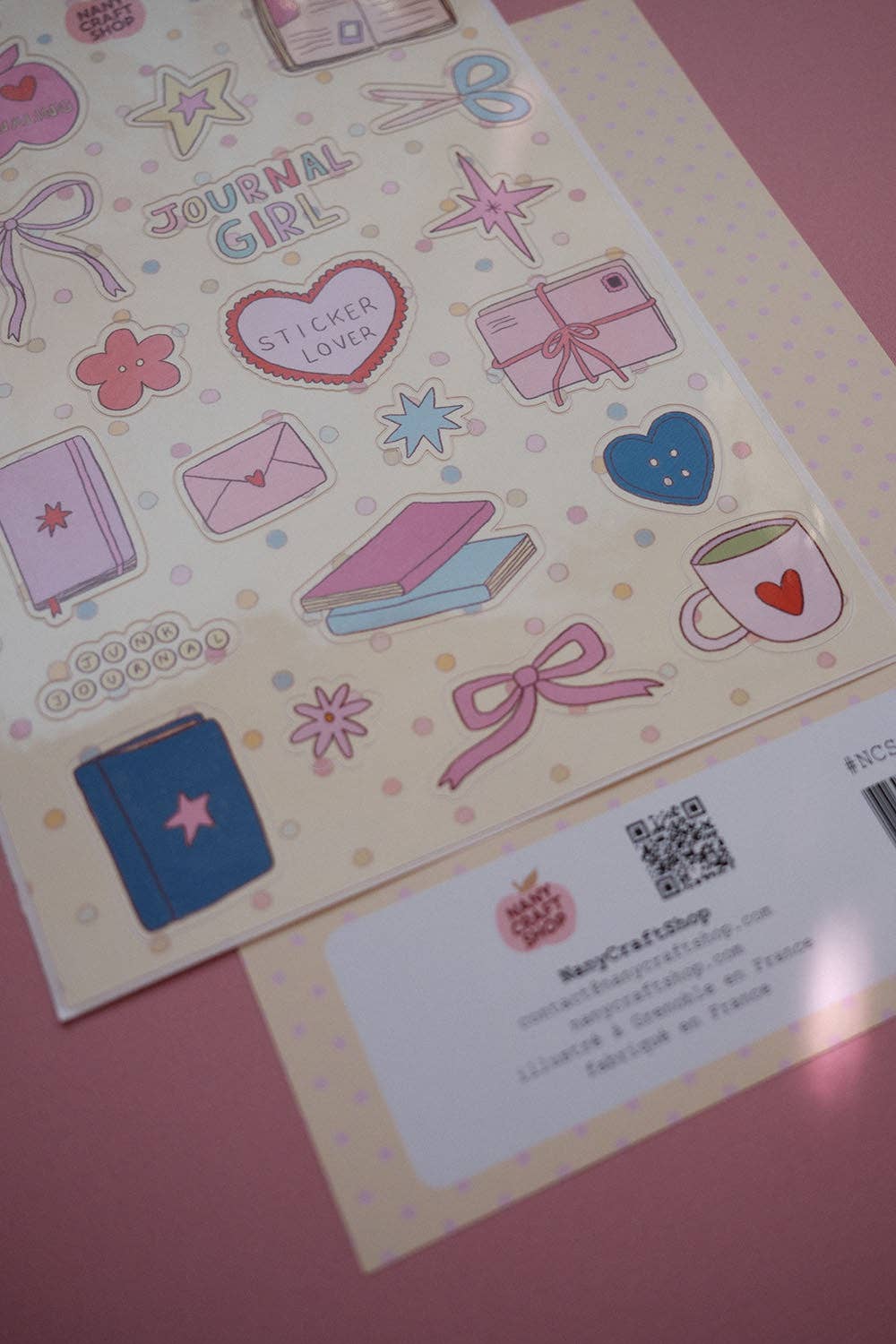 A5 sticker sheet with stationery stickers plus a white product label and QR code
