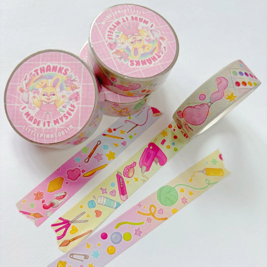 Colorful washi tape rolls and strips with pastel stationery hearts pattern