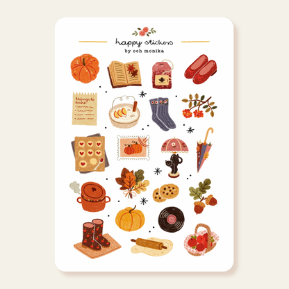 Autumn sticker sheet with pumpkins, leaves, books, socks, and kettle icons on white