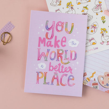 Purple postcard with colorful lettering: 'You make the world a better place'
