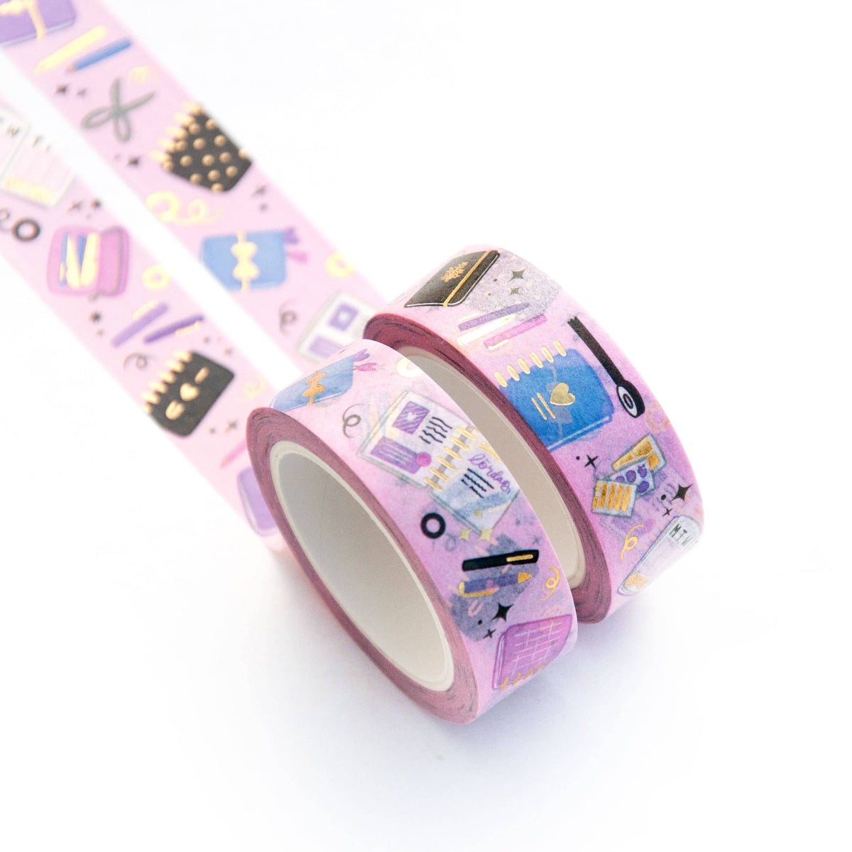 Washi tape roll with purple stationery-themed pattern and decorative edge